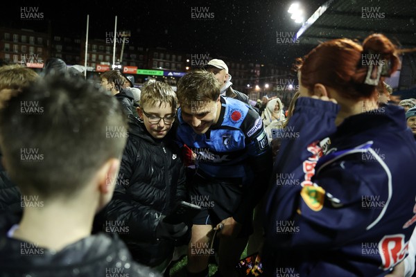 251025 - Cardiff Rugby v Edinburgh - United Rugby Championship - Jacob Beetham of Cardiff with fans at full time