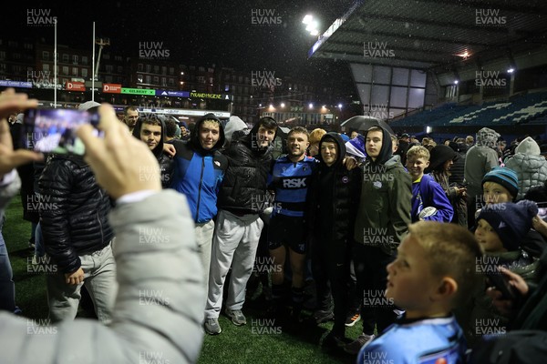 251025 - Cardiff Rugby v Edinburgh - United Rugby Championship - Tom Bowen of Cardiff with fans at full time