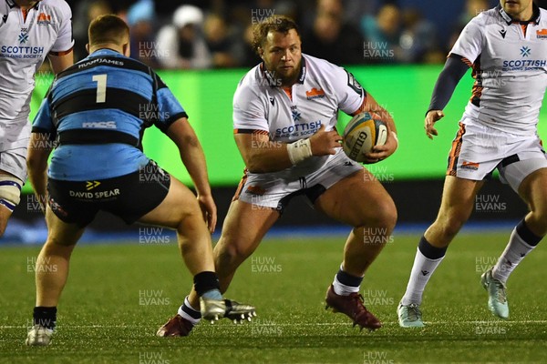 251025 - Cardiff Rugby v Edinburgh Rugby - United Rugby Championship - Pierre Schoeman of Edinburgh is challenged by Danny Southworth of Cardiff Rugby