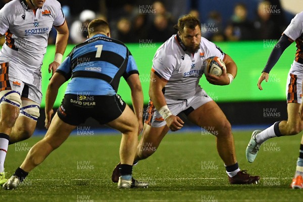 251025 - Cardiff Rugby v Edinburgh Rugby - United Rugby Championship - Pierre Schoeman of Edinburgh is challenged by Danny Southworth of Cardiff Rugby