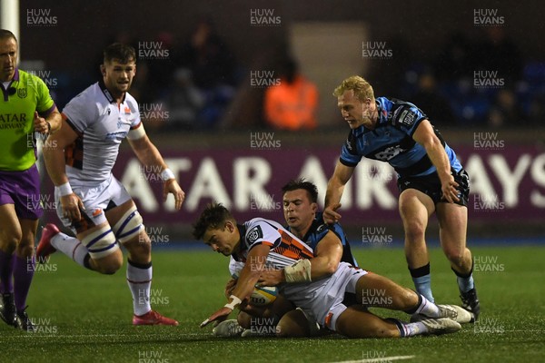 251025 - Cardiff Rugby v Edinburgh Rugby - United Rugby Championship - Ross Thompson of Edinburgh is challenged by Taine Basham of Cardiff Rugby