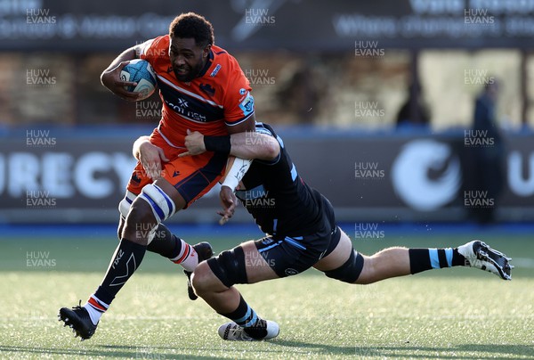 301022 - Cardiff Rugby v Edinburgh - BKT United Rugby Championship - Viliame Mata of Edinburgh is tackled by Rory Thornton of Cardiff