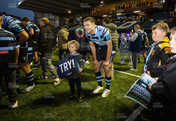 301022 - Cardiff Rugby v Edinburgh - BKT United Rugby Championship - Max Llewellyn of Cardiff with fans at full time