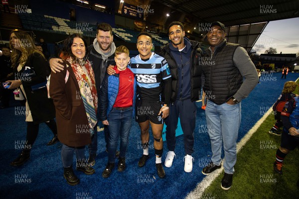 301022 - Cardiff Rugby v Edinburgh - BKT United Rugby Championship - Theo Cabango of Cardiff with his family at full time