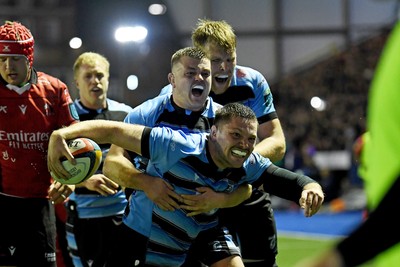 210325 - Cardiff Rugby v Emirates Lions - United Rugby Championship - Ben Donnell of Cardiff celebrates scoring a try with team mates