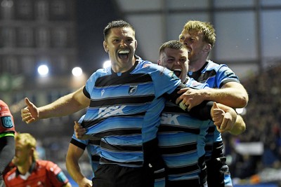 210325 - Cardiff Rugby v Emirates Lions - United Rugby Championship - Ben Donnell of Cardiff celebrates scoring a try with team mates