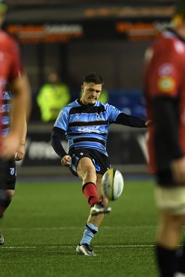 210325 - Cardiff Rugby v Emirates Lions - United Rugby Championship - Callum Sheedy of Cardiff kicks the ball