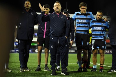 210325 - Cardiff Rugby v Emirates Lions - United Rugby Championship - Matt Sherratt, Cardiff Head Coach leads the team huddle at full time