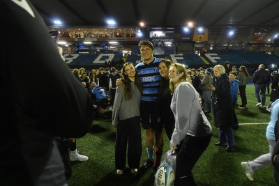 210325 - Cardiff Rugby v Emirates Lions - United Rugby Championship - Teddy Williams of Cardiff with fans at full time