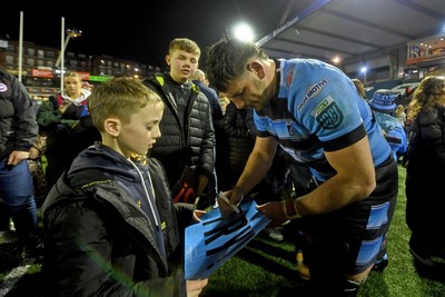 210325 - Cardiff Rugby v Emirates Lions - United Rugby Championship - Alun Lawrence of Cardiff with fans at full time