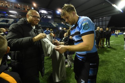 210325 - Cardiff Rugby v Emirates Lions - United Rugby Championship - Josh McNally of Cardiff with fans at full time