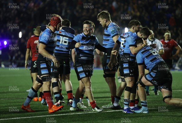 210325 - Cardiff Rugby v Emirates Lions - United Rugby Championship - Callum Sheedy and Cardiff celebrate the victory at full time