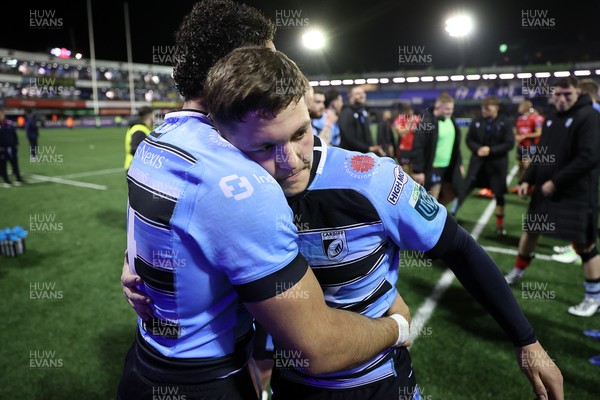 210325 - Cardiff Rugby v Emirates Lions - United Rugby Championship - Gabriel Hamer-Webb and Callum Sheedy of Cardiff at full time