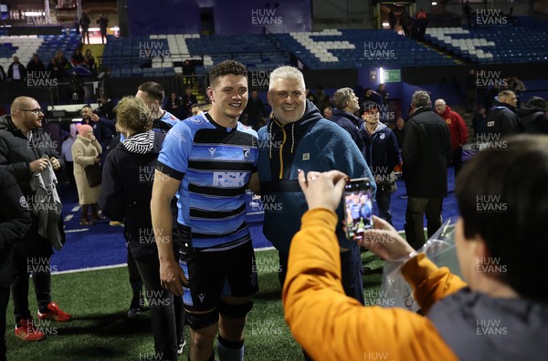 210325 - Cardiff Rugby v Emirates Lions - United Rugby Championship - James Botham of Cardiff with fans at full time