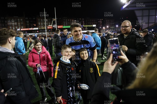 210325 - Cardiff Rugby v Emirates Lions - United Rugby Championship - Teddy Williams of Cardiff with fans at full time