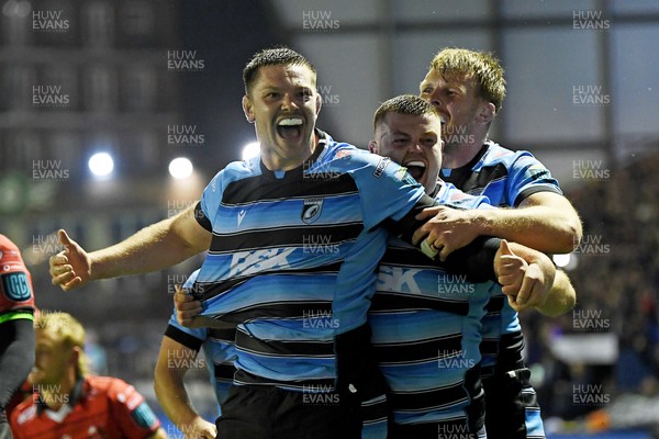 210325 - Cardiff Rugby v Emirates Lions - United Rugby Championship - Ben Donnell of Cardiff celebrates scoring a try with team mates