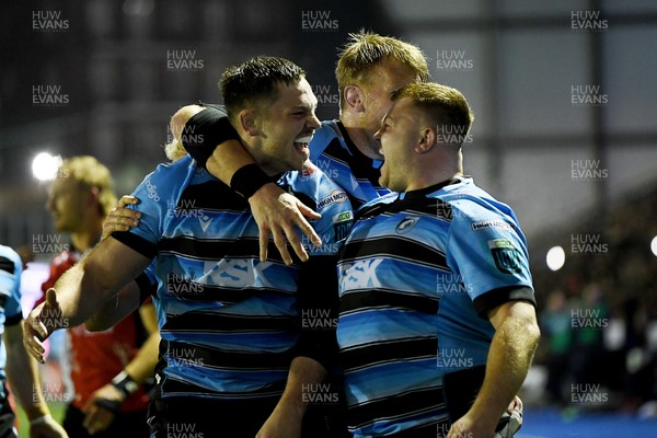 210325 - Cardiff Rugby v Emirates Lions - United Rugby Championship - Ben Donnell of Cardiff celebrates scoring a try with team mates