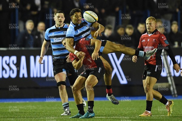 210325 - Cardiff Rugby v Emirates Lions - United Rugby Championship - Gabe Hammer-Webb of Cardiff is challenged by Marius Louw of Emirates Lions