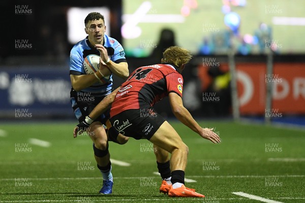 210325 - Cardiff Rugby v Emirates Lions - United Rugby Championship - Harri Millard of Cardiff is challenged by Richard Kriel of Emirates Lions