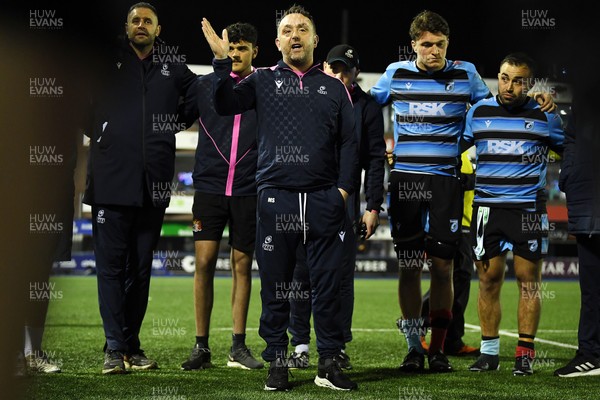 210325 - Cardiff Rugby v Emirates Lions - United Rugby Championship - Matt Sherratt, Cardiff Head Coach leads the team huddle at full time