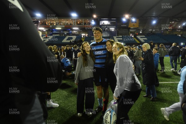 210325 - Cardiff Rugby v Emirates Lions - United Rugby Championship - Teddy Williams of Cardiff with fans at full time