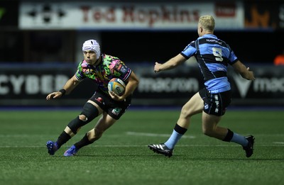 270925 - Cardiff Rugby v Emirates Lions - United Rugby Championship - Henco van Wyk of Lions is tackled by Johan Mulder of Cardiff 