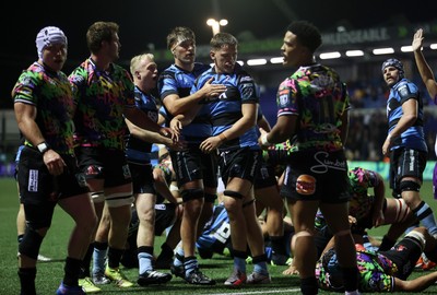 270925 - Cardiff Rugby v Emirates Lions - United Rugby Championship - Alex Mann of Cardiff celebrates scoring a try with team mates
