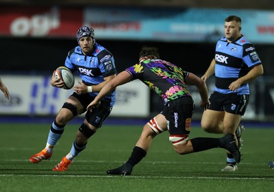 270925 - Cardiff Rugby v Emirates Lions - United Rugby Championship - Alun Lawrence of Cardiff is challenged by Jarod Cairns of Lions 