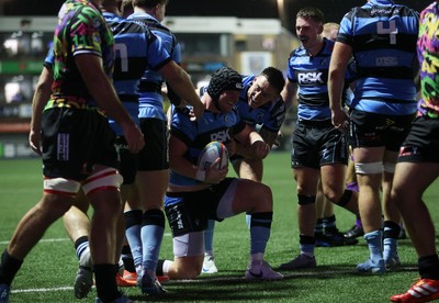 270925 - Cardiff Rugby v Emirates Lions - United Rugby Championship - Evan Lloyd of Cardiff celebrates scoring a try with team mates