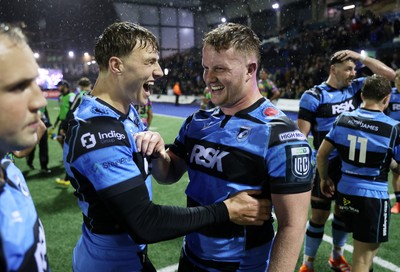 270925 - Cardiff Rugby v Emirates Lions - United Rugby Championship - Jacob Beetham and Evan Lloyd of Cardiff celebrate at full time