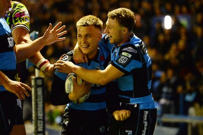 270925 - Cardiff Rugby v Emirates Lions - United Rugby Championship - Cam Winnett of Cardiff Rugby celebrates scoring a try with team mates