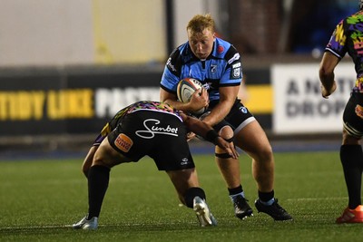 270925 - Cardiff Rugby v Emirates Lions - United Rugby Championship - Rhys Barratt of Cardiff Rugby is challenged by SJ Kotze of Lions
