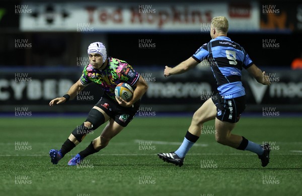 270925 - Cardiff Rugby v Emirates Lions - United Rugby Championship - Henco van Wyk of Lions is tackled by Johan Mulder of Cardiff 