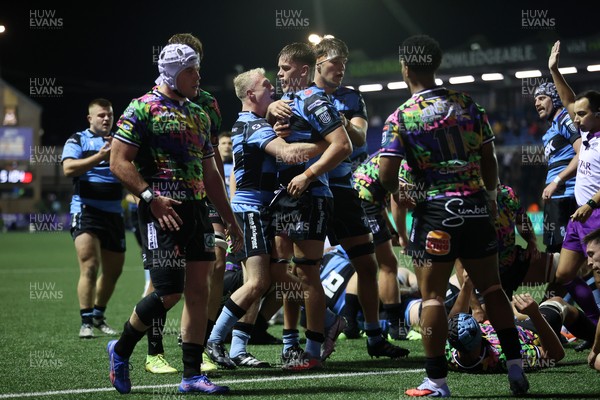 270925 - Cardiff Rugby v Emirates Lions - United Rugby Championship - Alex Mann of Cardiff celebrates scoring a try with team mates