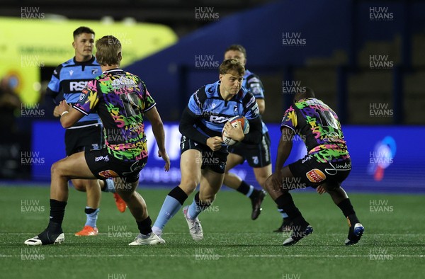 270925 - Cardiff Rugby v Emirates Lions - United Rugby Championship - Jacob Beetham of Cardiff is tackled by Rynhardt Jonker of Lions 