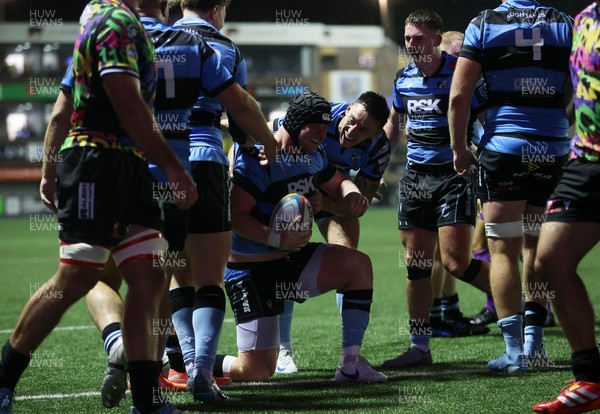270925 - Cardiff Rugby v Emirates Lions - United Rugby Championship - Evan Lloyd of Cardiff celebrates scoring a try with team mates