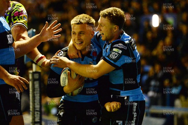 270925 - Cardiff Rugby v Emirates Lions - United Rugby Championship - Cam Winnett of Cardiff Rugby celebrates scoring a try with team mates