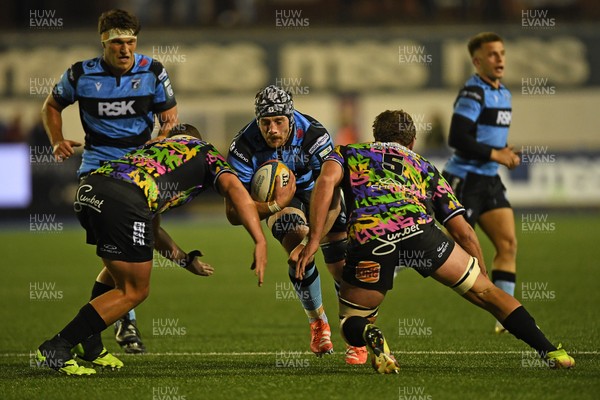 270925 - Cardiff Rugby v Emirates Lions - United Rugby Championship - Alun Lawrence of Cardiff Rugby is challenged by Ruan Delport of Lions
