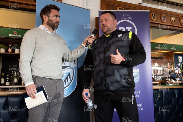 260322 - Cardiff Rugby v Glasgow Warriors, United Rugby Championship - Cardiff Rugby Director of Rugby Dai Young talks with Nicky Robinson in hospitality ahead of the match