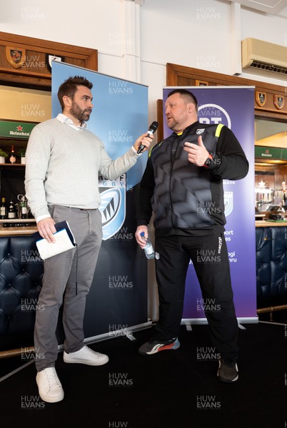 260322 - Cardiff Rugby v Glasgow Warriors, United Rugby Championship - Cardiff Rugby Director of Rugby Dai Young talks with Nicky Robinson in hospitality ahead of the match