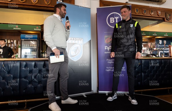260322 - Cardiff Rugby v Glasgow Warriors, United Rugby Championship - Rhys Priestland talks with Nicky Robinson in hospitality ahead of the match