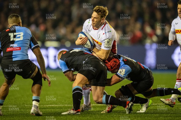 130124 - Cardiff Rugby v Harlequins - Investec Champions Cup - Alex Dombrandt of Harlequins is tackled by Tinus de Beer of Cardiff Rugby and James Botham of Cardiff Rugby