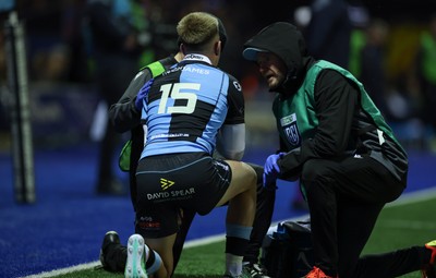 231026 Cardiff Rugby v Hollywoodbets Sharks, BKT United Rugby Championship - Cam Winnett of Cardiff Rugby us treated after taking a knock