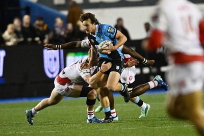 231026 - Cardiff Rugby v Hollywoodbets Sharks - United Rugby Championship - Le Roux Malan of Cardiff Rugby is challenged by Manu Tshituka of Sharks