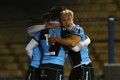 231026 - Cardiff Rugby v Hollywoodbets Sharks - United Rugby Championship - Josh Adams of Cardiff Rugby celebrates scoring a try with team mates