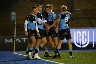 231026 - Cardiff Rugby v Hollywoodbets Sharks - United Rugby Championship - Josh Adams of Cardiff Rugby celebrates scoring a try with team mates