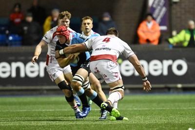 231026 - Cardiff Rugby v Hollywoodbets Sharks - United Rugby Championship - James Botham of Cardiff Rugby is challenged by Jason Jenkins of Sharks