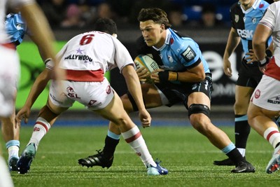 231026 - Cardiff Rugby v Hollywoodbets Sharks - United Rugby Championship - Teddy Williams of Cardiff Rugby is challenged by Matt Romao of Sharks