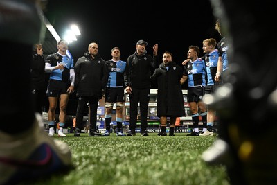 231026 - Cardiff Rugby v Hollywoodbets Sharks - United Rugby Championship - Cardiff head coach, Corniel Van Zyl leas his sides huddle at full time