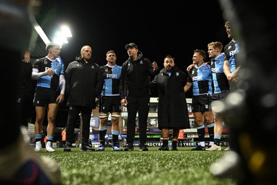 231026 - Cardiff Rugby v Hollywoodbets Sharks - United Rugby Championship - Cardiff head coach, Corniel Van Zyl leas his sides huddle at full time